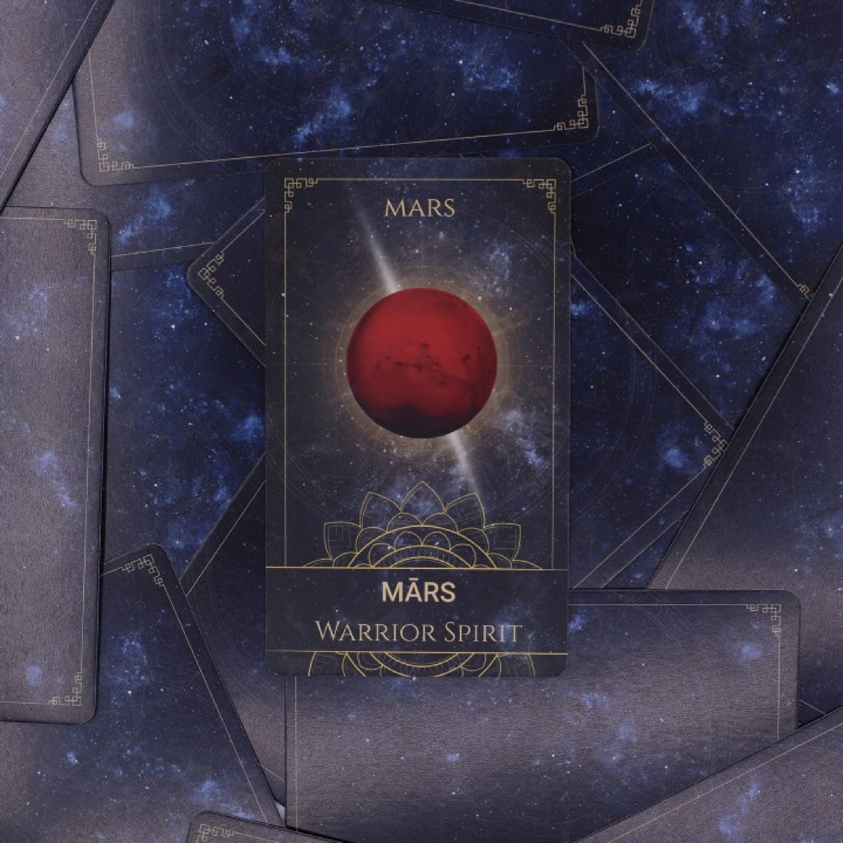 Karta Mars Warrior Spirit z balíčku Celestial Oracle Cards na pozadí rozložených karet